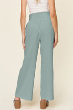Load image into Gallery viewer, Double Take Full Size Texture Smocked Waist Wide Leg Pants
