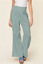 Load image into Gallery viewer, Double Take Full Size Texture Smocked Waist Wide Leg Pants