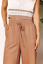 Load image into Gallery viewer, Double Take Drawstring Smocked Waist Wide Leg Pants Ti Amo I love you