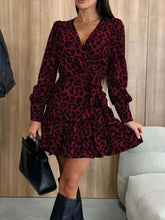 Load image into Gallery viewer, Tied Leopard Surplice Long Sleeve Dress
