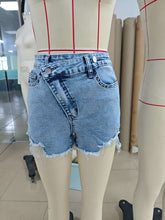 Load image into Gallery viewer, Ladies Asymmetric Hem Stretch Light Blue High Low Button Ripped Denim Shorts
