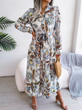 Load image into Gallery viewer, Tied Printed Long Sleeve Midi Dress
