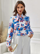 Load image into Gallery viewer, Floral Tie Neck Long Sleeve Blouse
