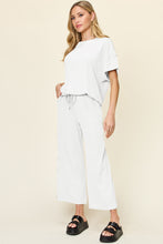 Load image into Gallery viewer, Double Take Full Size Texture Round Neck Short Sleeve T-Shirt and Wide Leg Pants
