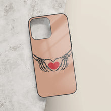 Load image into Gallery viewer, Ti Amo I love you - Exclusive Brand - Feldspar - Skeleton Hands with Heart -  iPhone 14 Glass Case (3 cameras)
