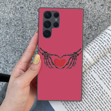 Load image into Gallery viewer, Ti Amo I love you - Exclusive Brand - Viva Magenta - Skeleton Hands with Heart - Samsung Galaxy S22 Ultra Glass Case
