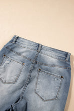 Load image into Gallery viewer, Dusk Blue Vintage Light Wash Ripped Raw Edge Flare Jeans
