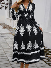 Load image into Gallery viewer, Devine Ruffled Printed Plunge Long Sleeve Dress
