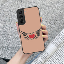 Load image into Gallery viewer, Ti Amo I love you - Exclusive Brand - Feldspar - Skeleton Hands with Heart - Samsung Galaxy S22 Glass Case
