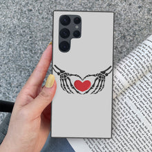 Load image into Gallery viewer, Ti Amo I love you - Exclusive Brand - Silver - Skeleton Hands with Heart - Samsung Galaxy S22 Ultra Glass Case
