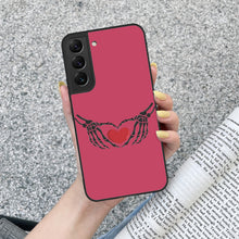 Load image into Gallery viewer, Ti Amo I love you - Exclusive Brand - Viva Magenta - Skeleton Hands with Heart - Samsung Galaxy S22 Glass Case
