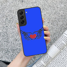 Load image into Gallery viewer, Ti Amo I love you - Exclusive Brand - Blue Blue Eyes - Skeleton Hands with Heart - Samsung Galaxy S22 Glass Case
